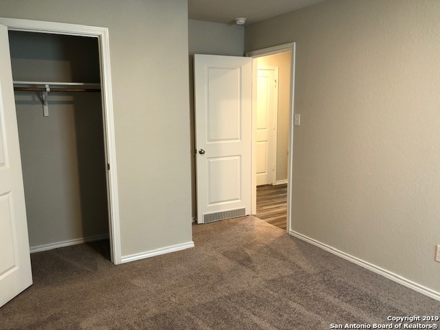 9015 Little Hoss Converse, TX 78109 - Photo 9 of 17 a view of an empty room with closet