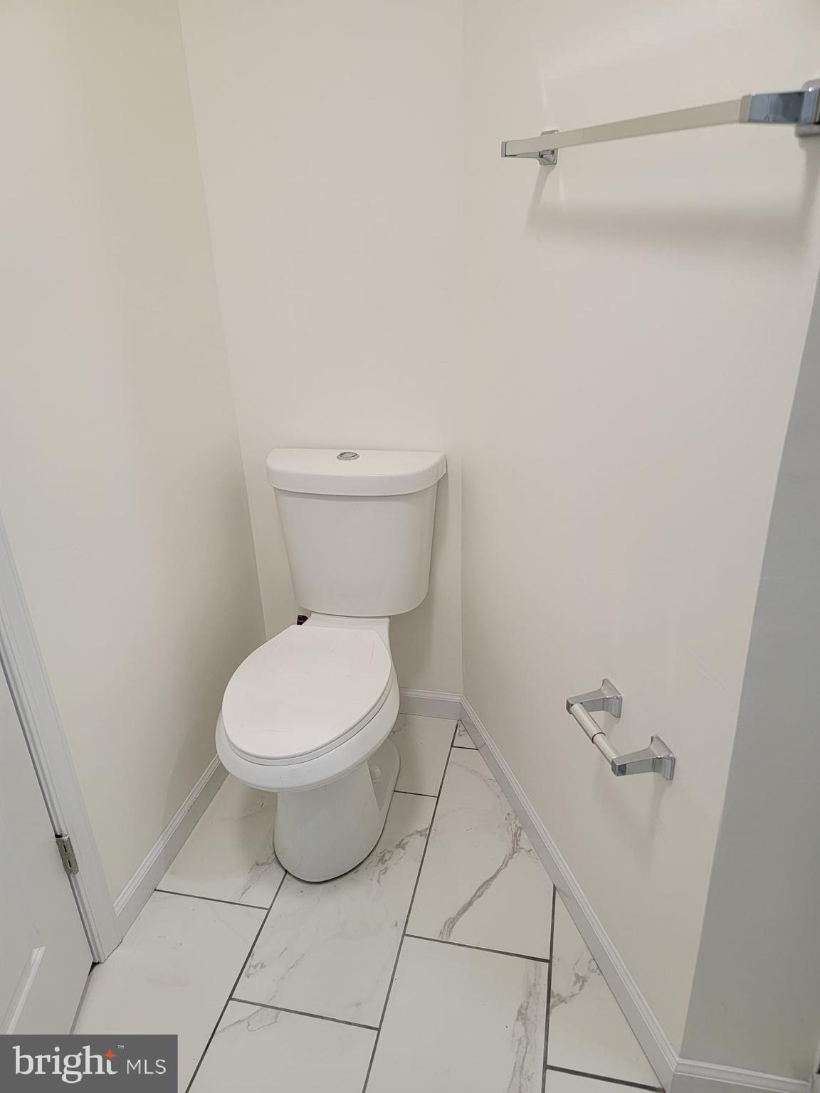 616 Tasker Street, Unit 2 Philadelphia, PA 19148 - Photo 18 of 22 a bathroom with a toilet and a shower