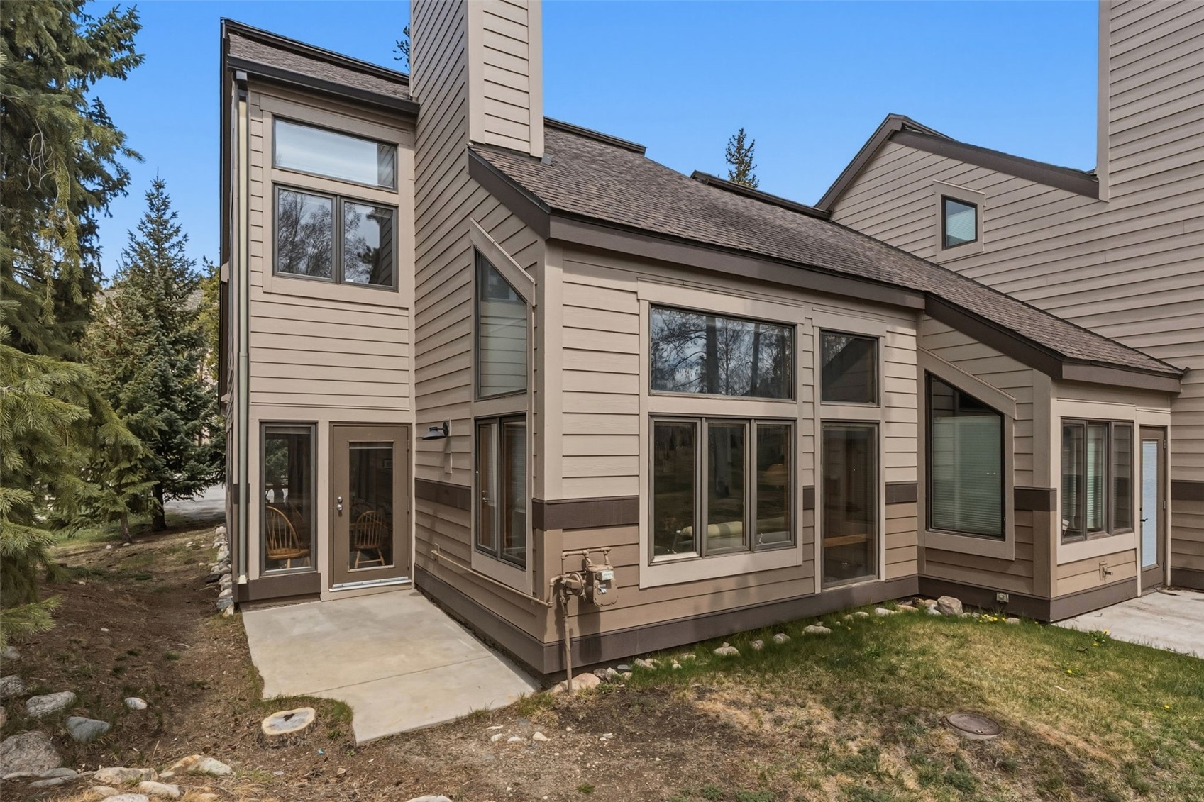 30 Tennis Club Road, Unit 1608 Keystone, CO 80435 - Photo 7 of 29 a view of a house with a large window and wooden fence