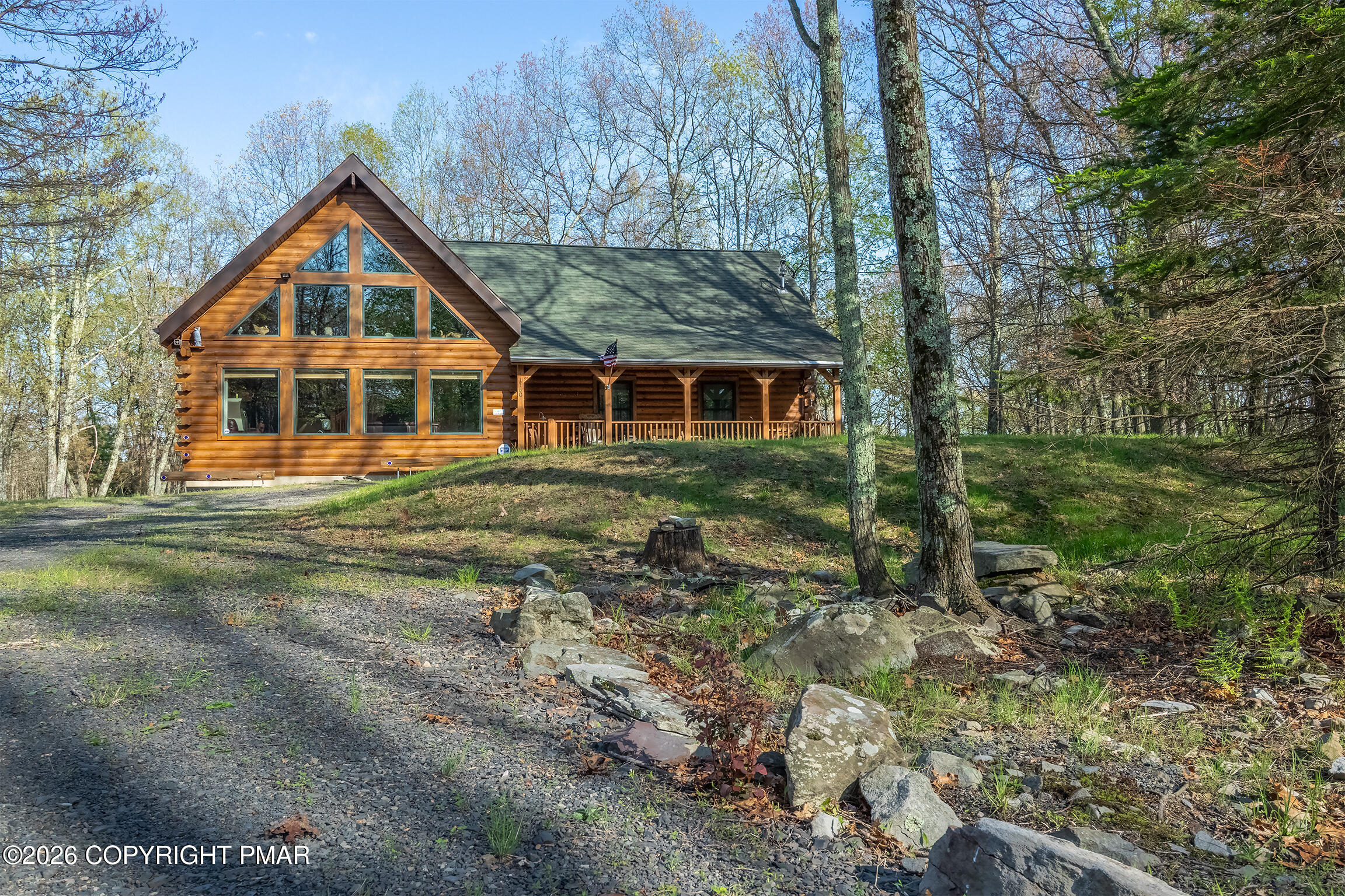 1160 Bluebird Lane Bushkill, PA 18324 - Photo 44 of 44 a view of a house with a yard