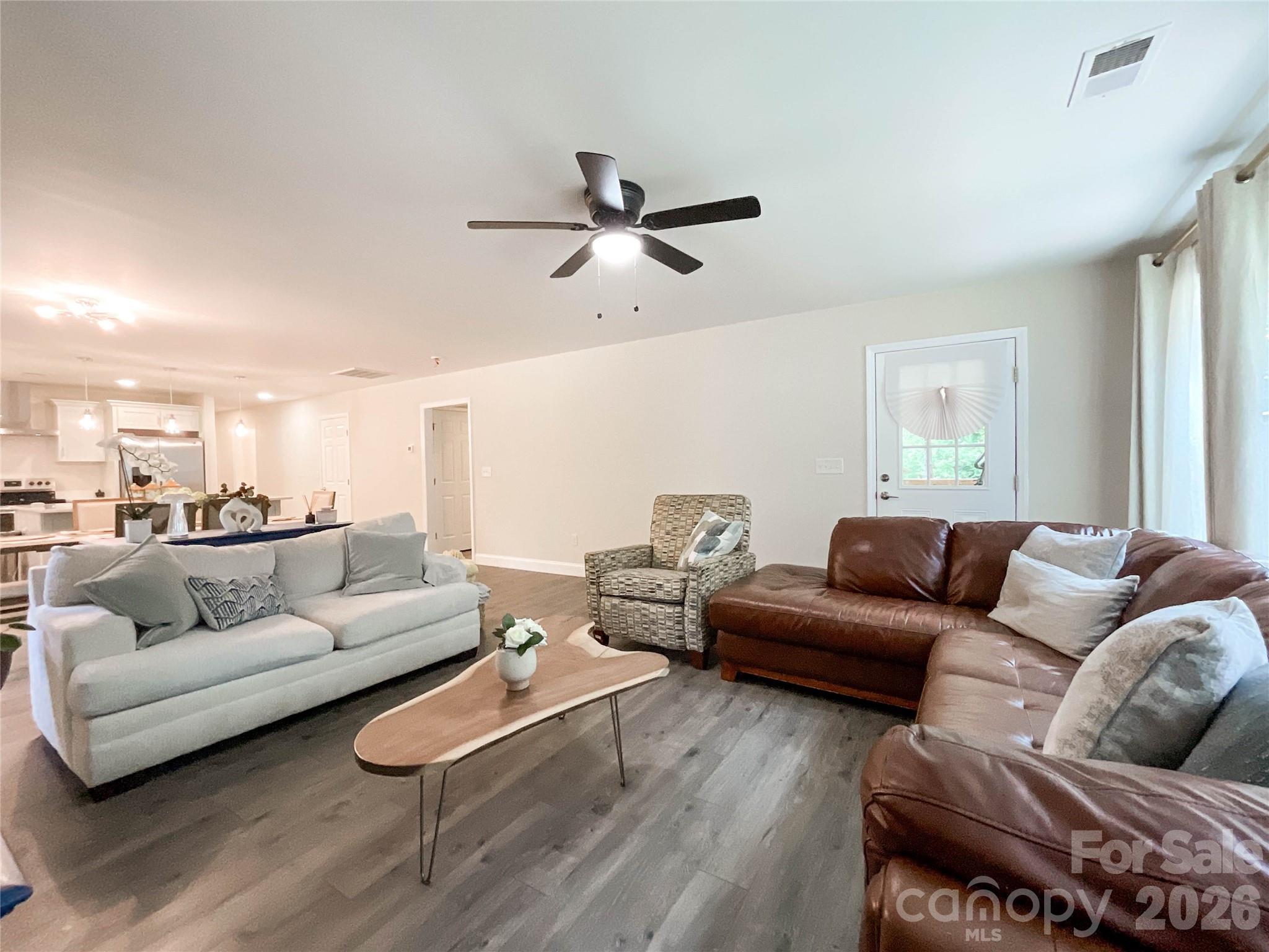 404 White Store Road Wadesboro, NC 28170 - Photo 19 of 38 a living room with furniture window and a couch