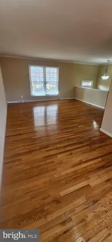 a view of a house with backyard porch and sitting area