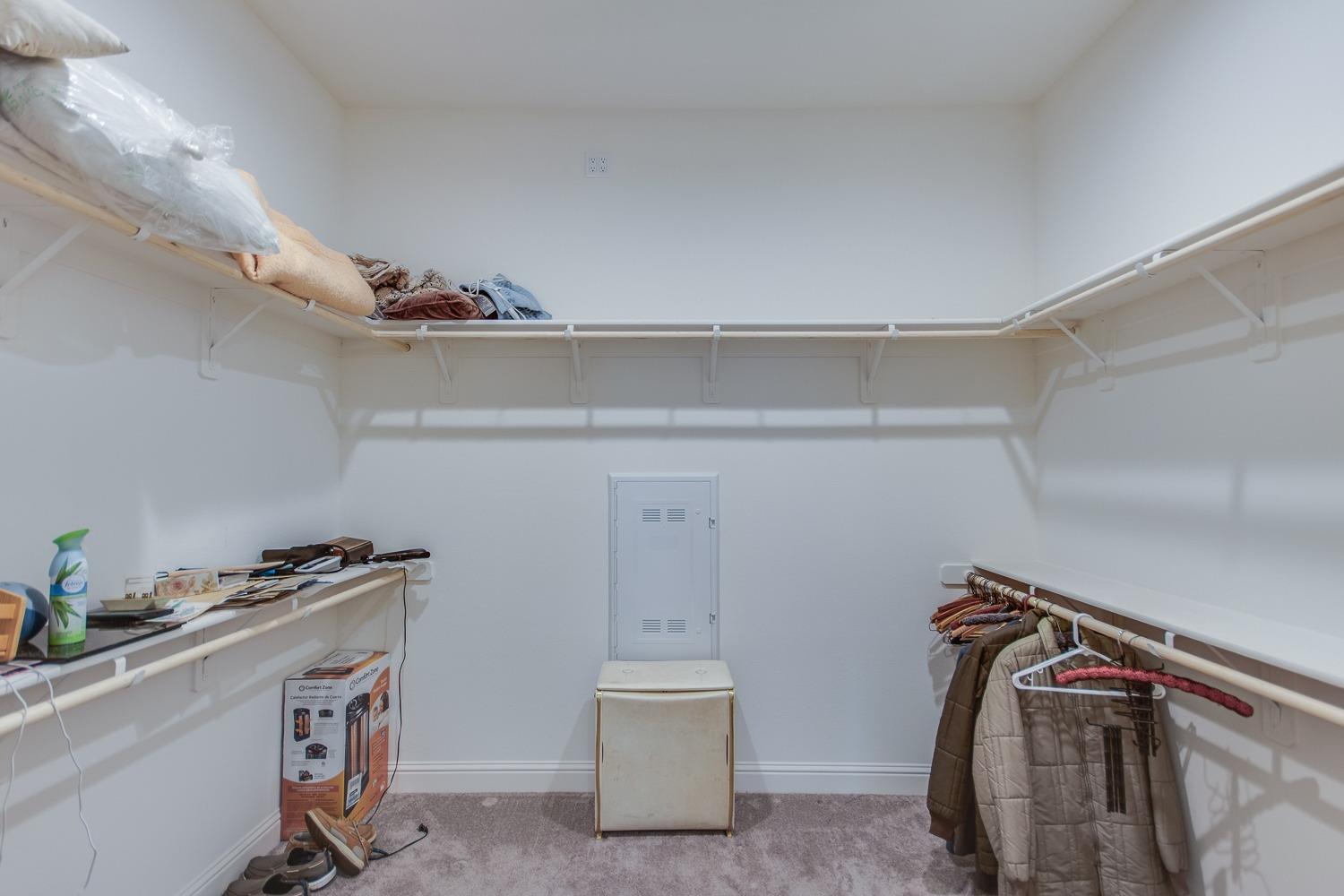 3027 Twain Avenue Clovis, CA 93619 - Photo 24 of 32 a utility room with cabinets dryer and washer
