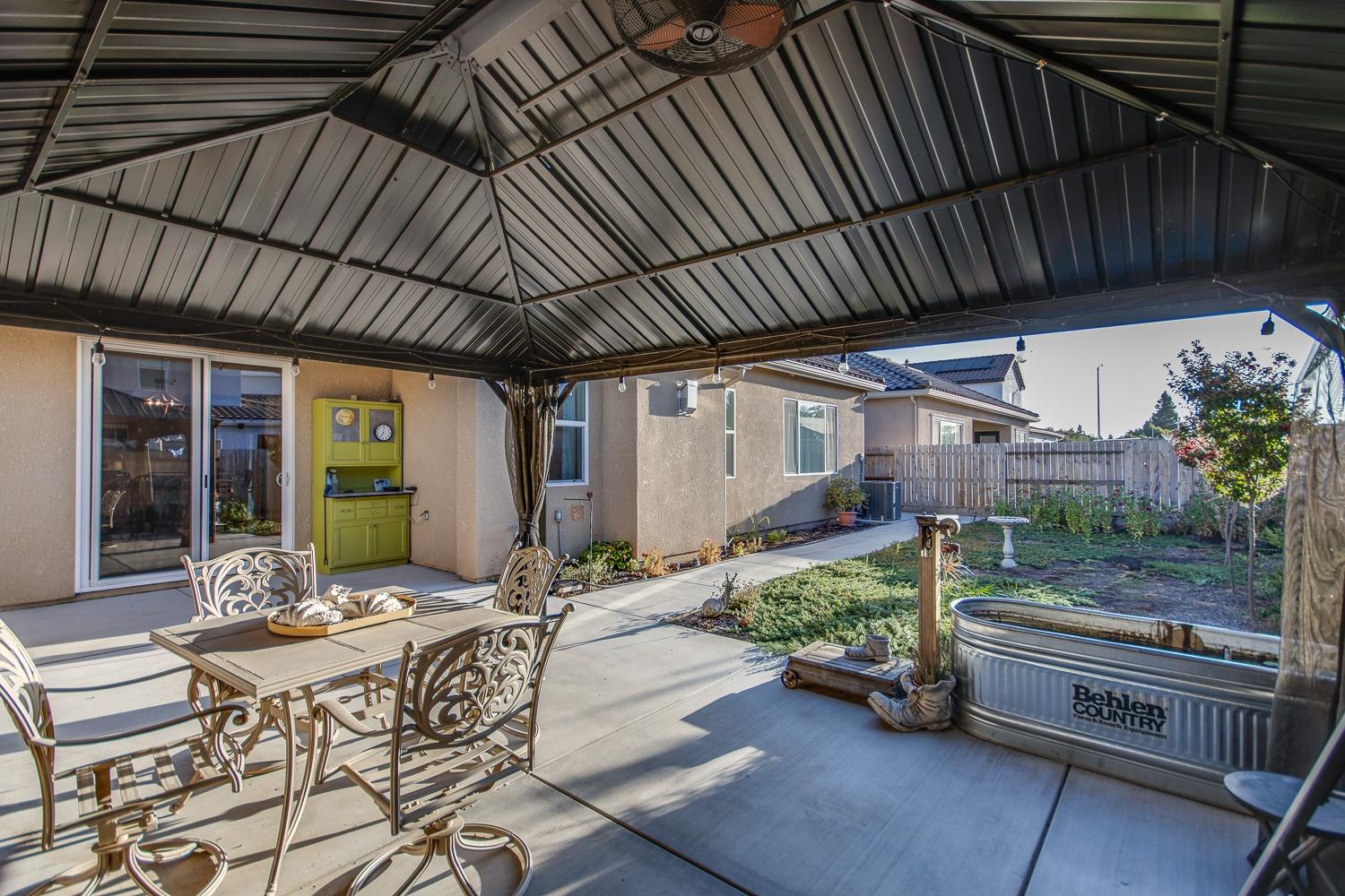 3027 Twain Avenue Clovis, CA 93619 - Photo 30 of 32 a view of an outdoor sitting area with furniture