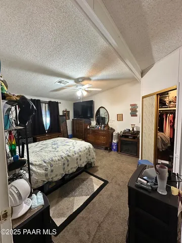 a view of swimming pool with a patio