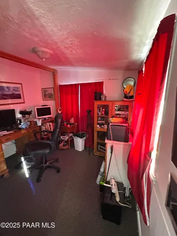 a view of house with outdoor seating