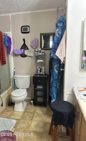 a view of a house with a tree