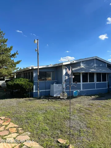 a front view of a house with a garage