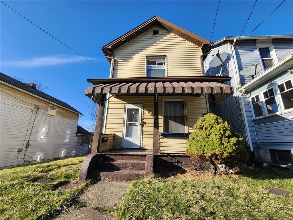 26 West Terrace Avenue New Castle, PA 16102 - Photo 1 of 12 a front view of a house with garden