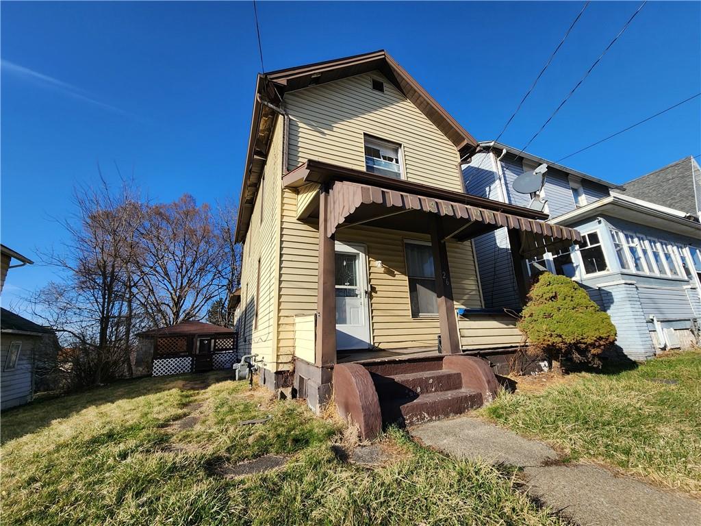 26 West Terrace Avenue New Castle, PA 16102 - Photo 2 of 12 a front view of a house with a yard
