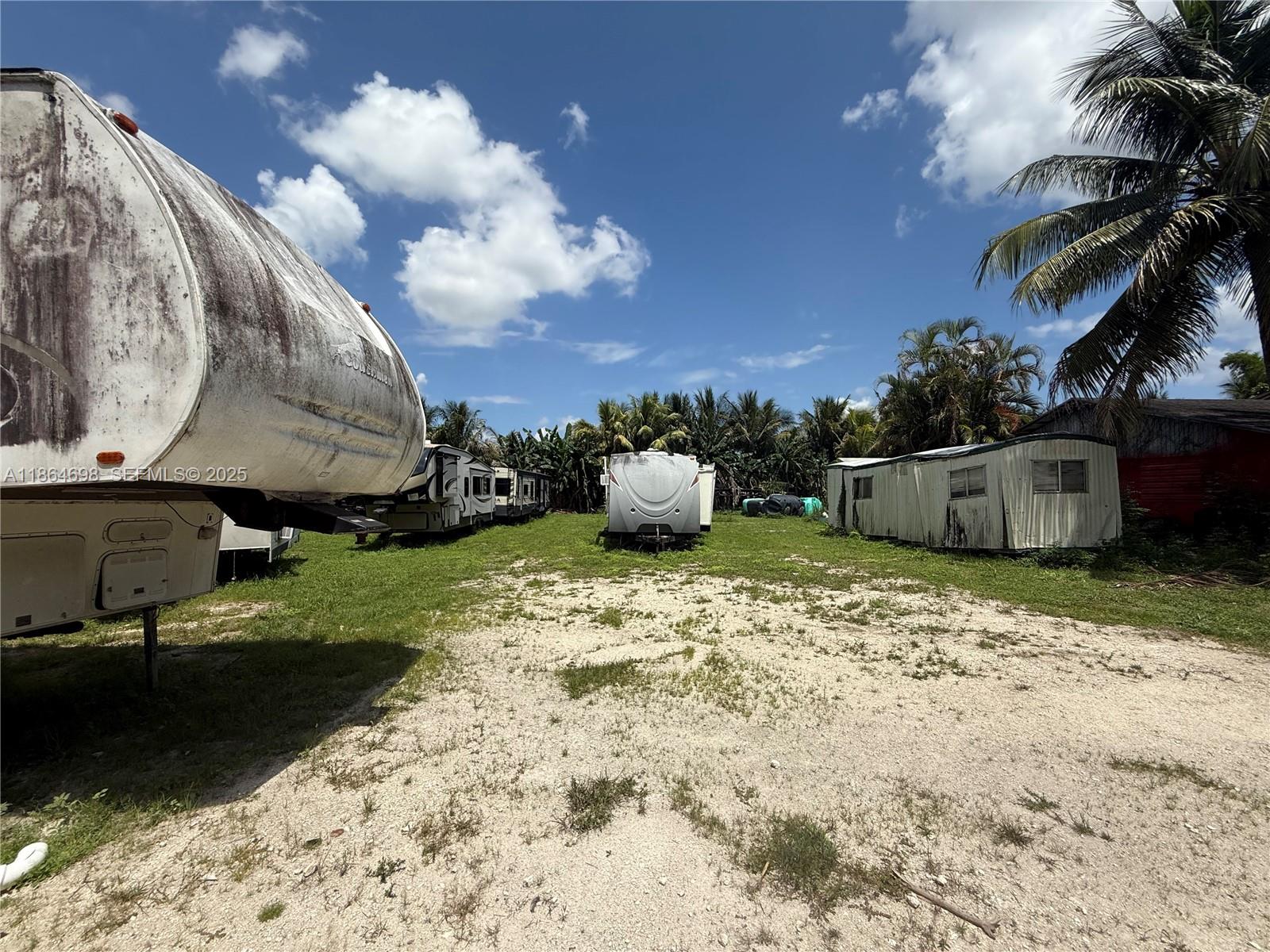 15765 Southwest 206th Avenue Miami, FL 33187 - Photo 16 of 57 a bathroom with a sink and a mirror