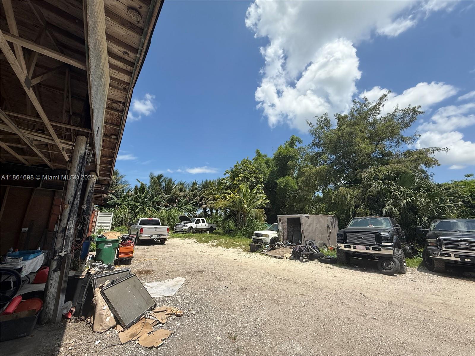 15765 Southwest 206th Avenue Miami, FL 33187 - Photo 23 of 57 a car parked on the side of the road