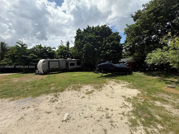 a view of backyard with green space