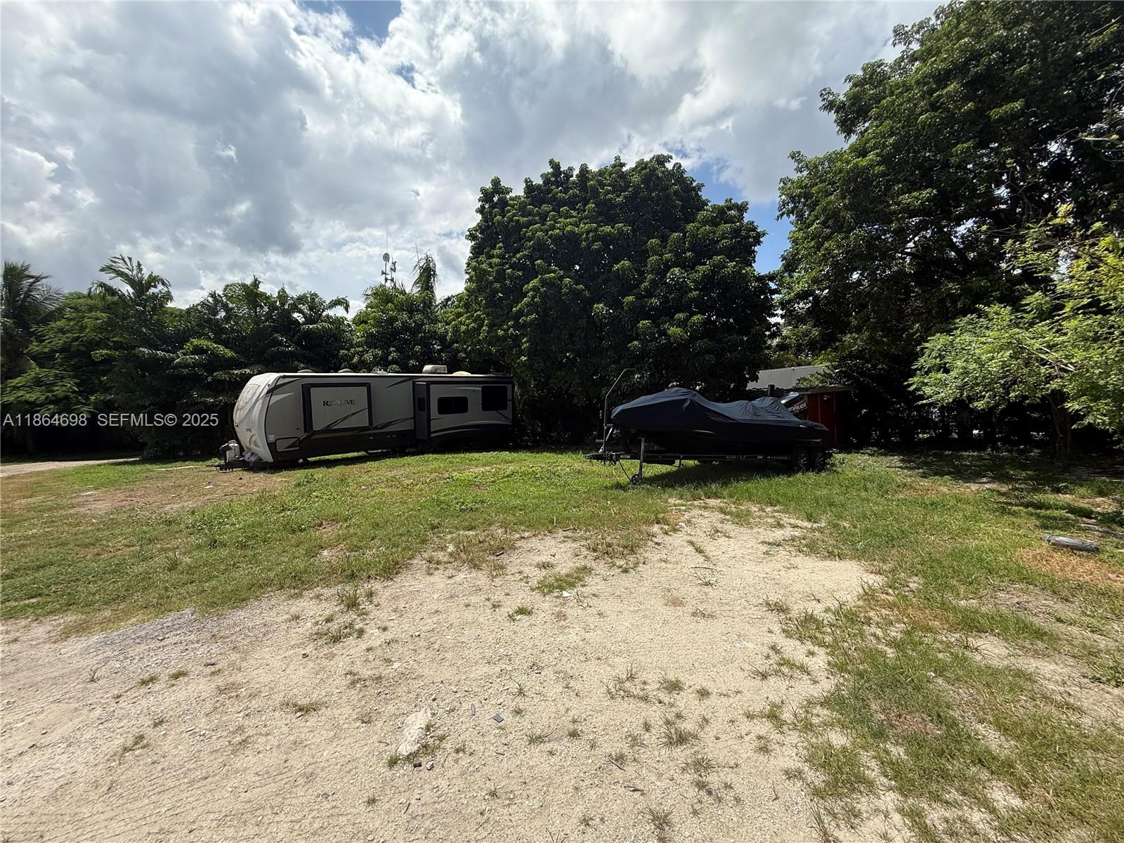 15765 Southwest 206th Avenue Miami, FL 33187 - Photo 34 of 57 a view of garden with patio