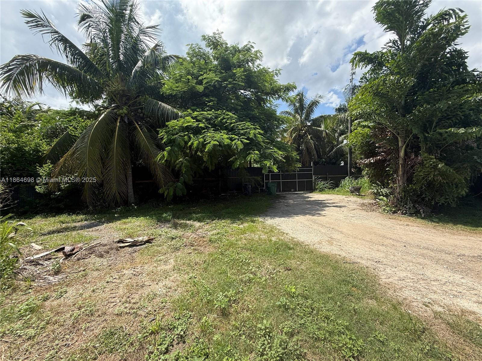 15765 Southwest 206th Avenue Miami, FL 33187 - Photo 37 of 57 a view of outdoor space and yard