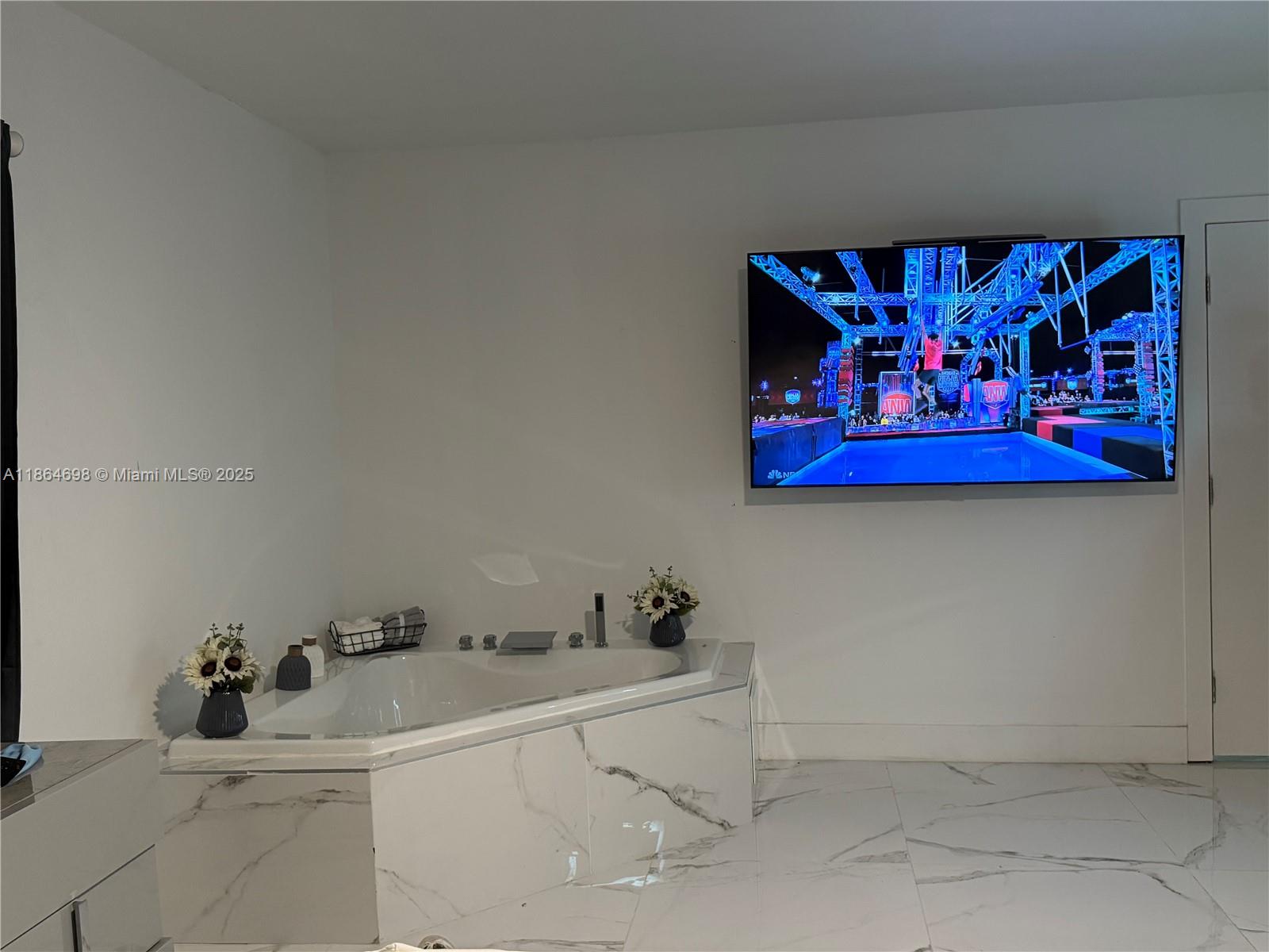 15765 Southwest 206th Avenue Miami, FL 33187 - Photo 49 of 57 a bathroom with a sink and a mirror