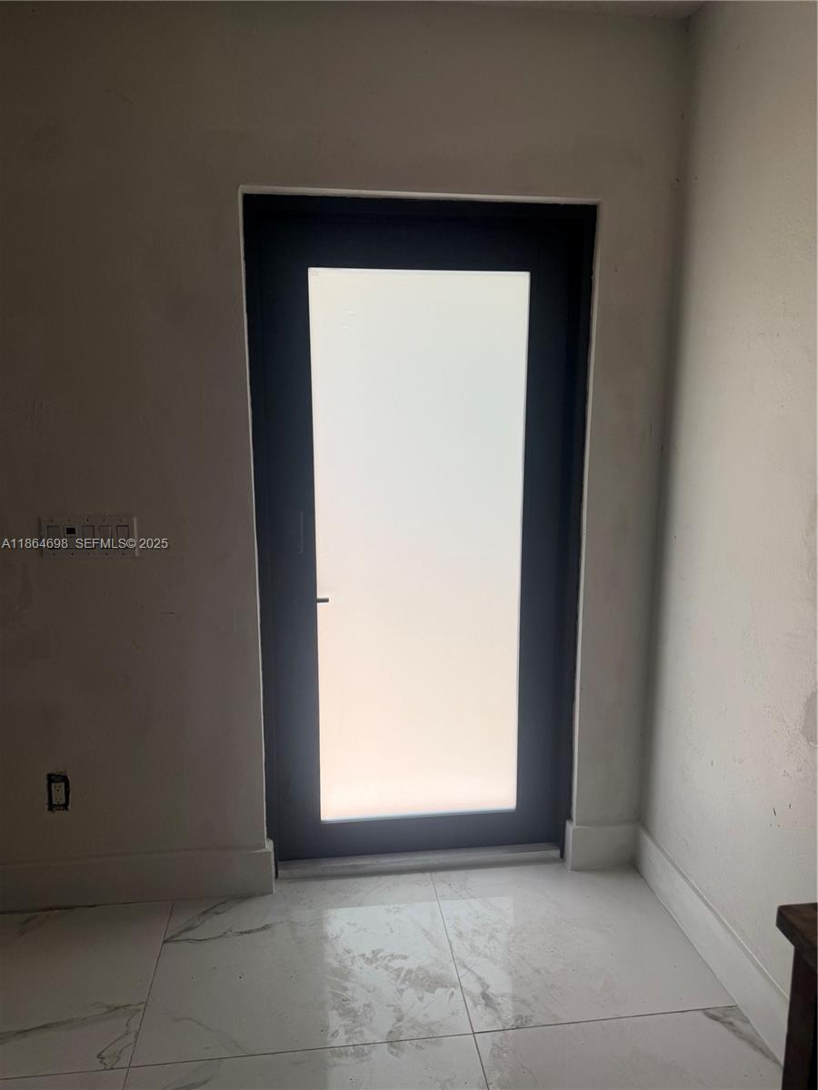 15765 Southwest 206th Avenue Miami, FL 33187 - Photo 56 of 57 a view of entryway with a sink