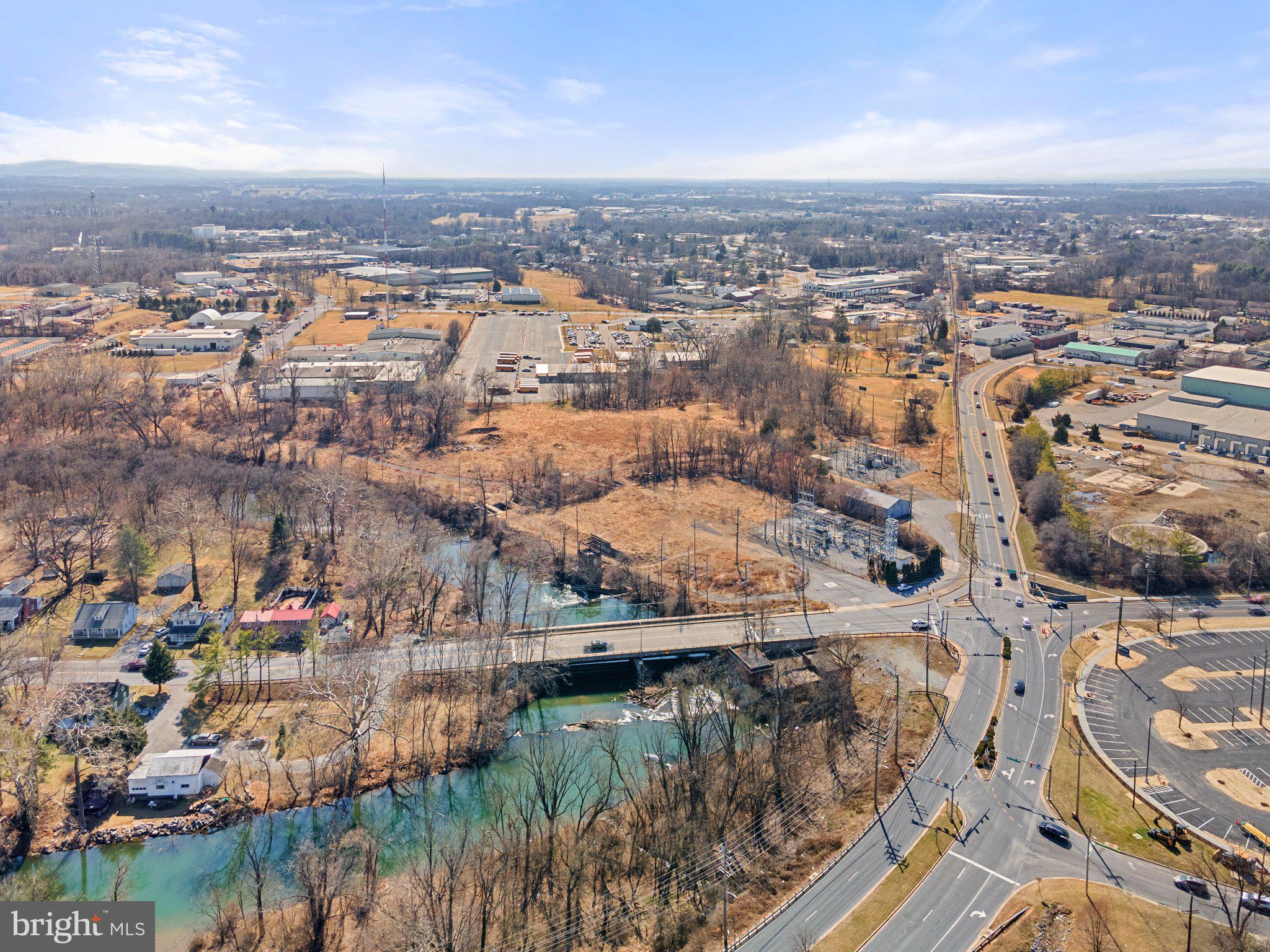 703-705 Mt Aetna Road Hagerstown, MD 21740 - Photo 1 of 21 an aerial view of residential building and lake