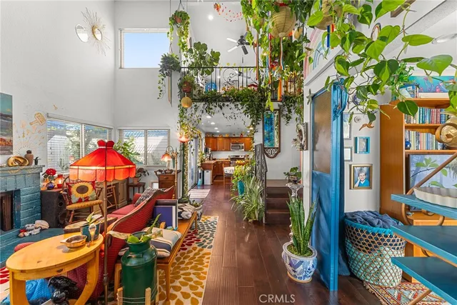 a view of a tennis room with a bed