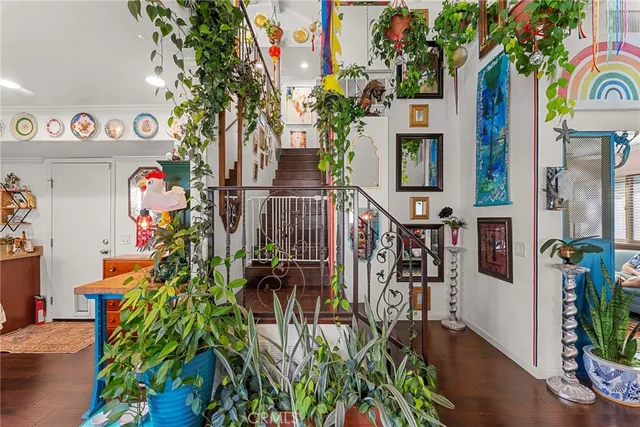 an workspace with furniture and painting on the wall