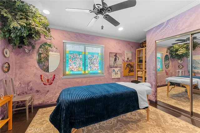 a bathroom with a double vanity sink and mirror with bathtub