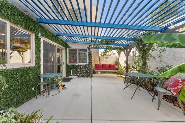 an aerial view of residential houses with city view