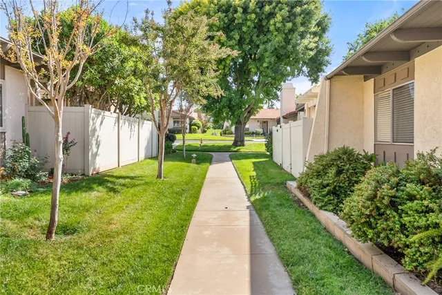 a view of a back yard with green space