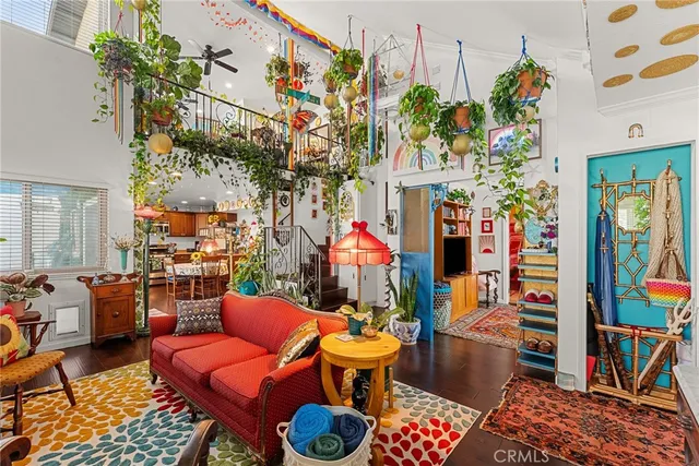 a living room filled with furniture and a fireplace