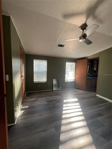 a view of entryway and hall with a window