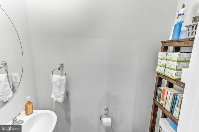 a bathroom with a toilet and a sink