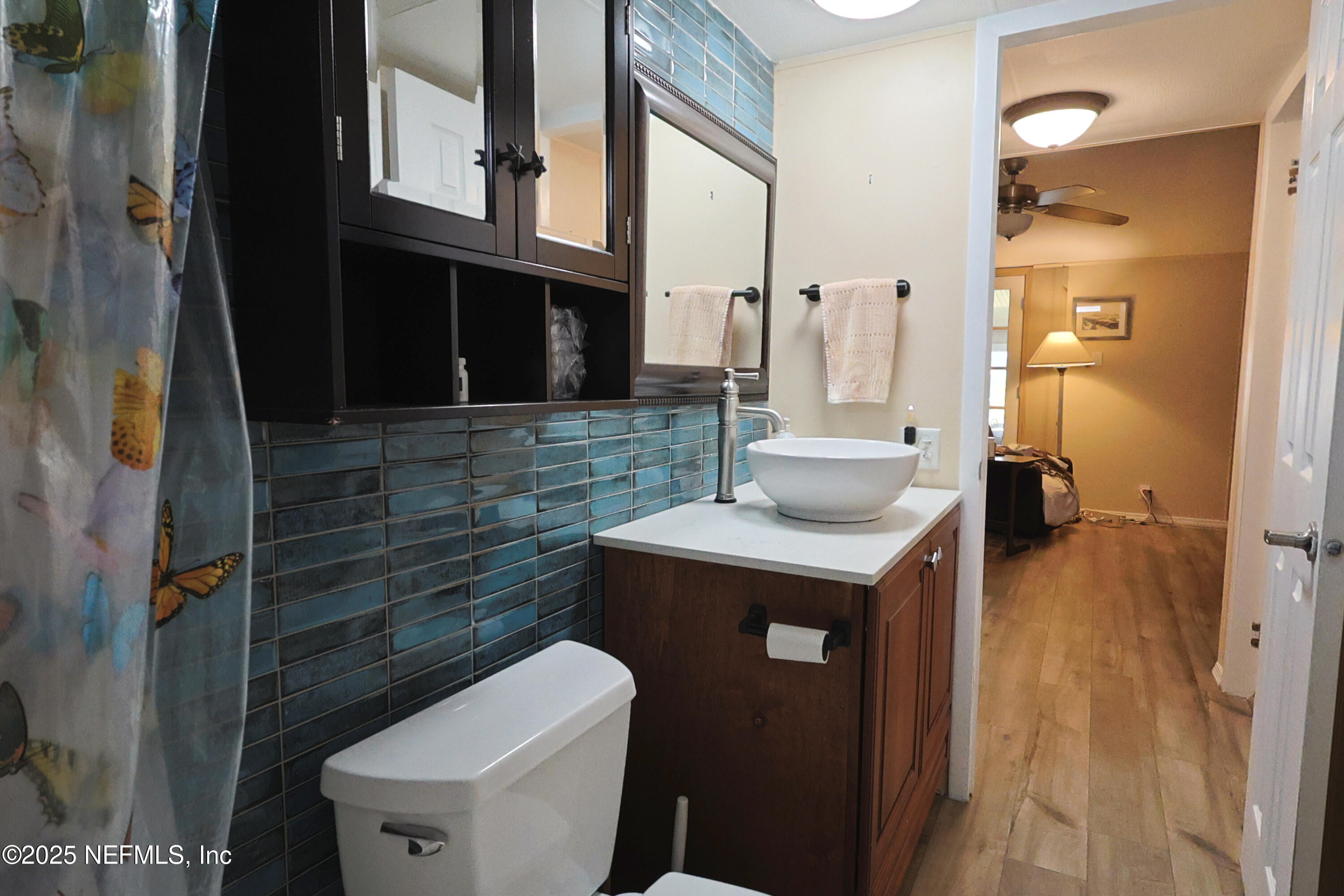 138 Edgewater Road Satsuma, FL 32189 - Photo 34 of 45 a bathroom with a sink a toilet and shower