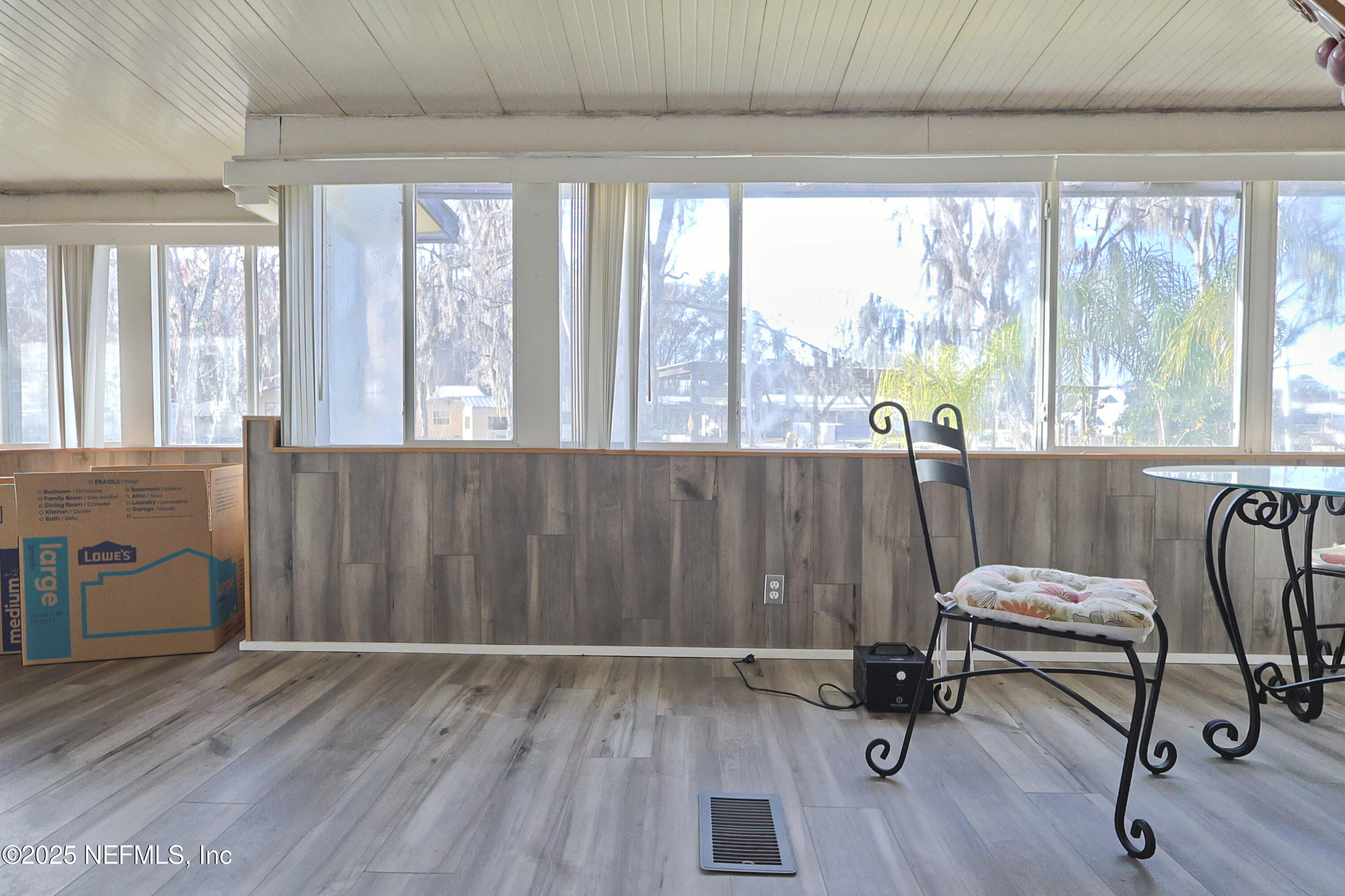 138 Edgewater Road Satsuma, FL 32189 - Photo 38 of 45 a view of a workspace with furniture and a window