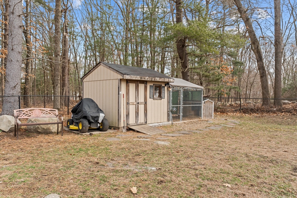 8 Gelding Road Chelmsford, MA 01824 - Photo 39 of 40 a view of a house with backyard