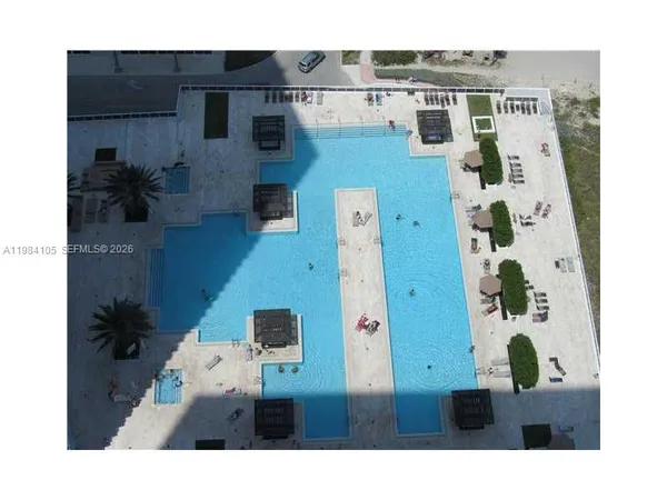 an aerial view of a house with outdoor space