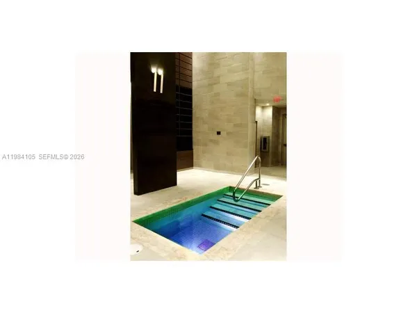 a living room with a rug