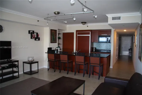 a view of kitchen with dining area