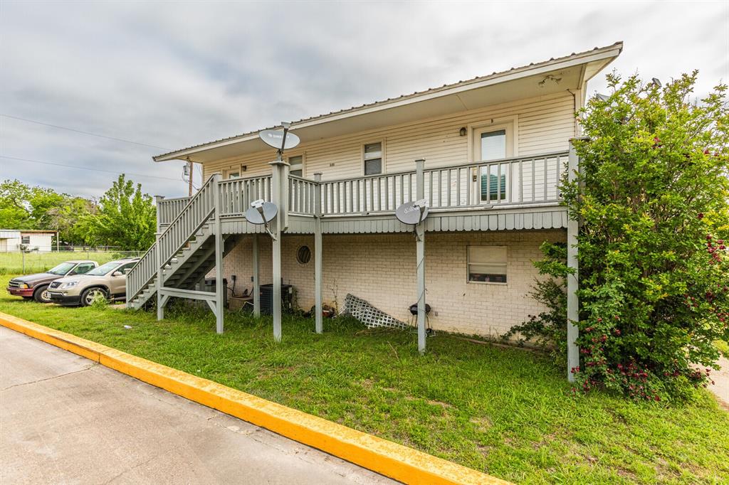 520 Live Oak Street Meridian, TX 76665 - Photo 1 of 9 a view of a house with backyard and porch