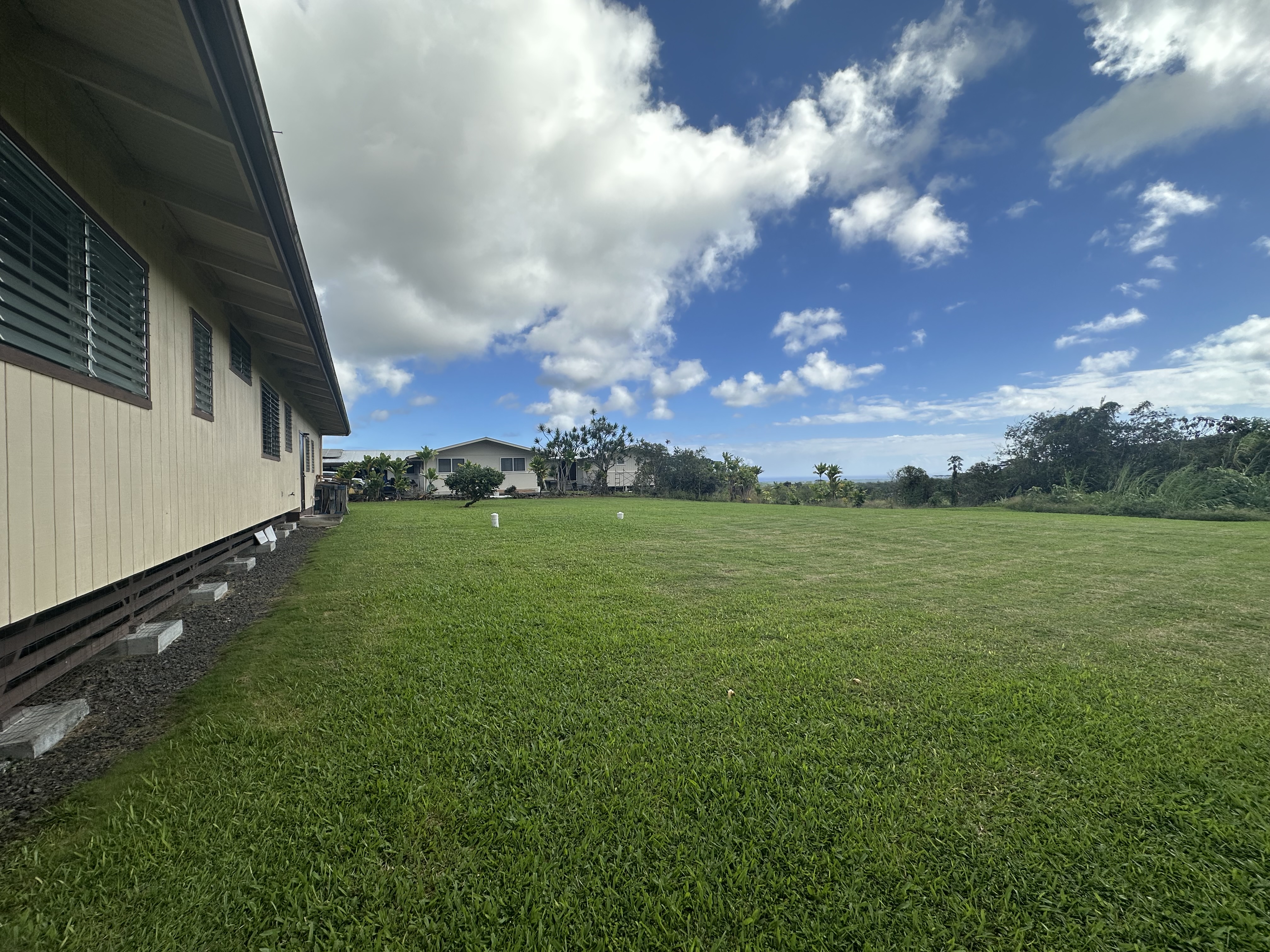 17-303 Pilikino Road Kurtistown, HI 96760 - Photo 4 of 7 a view of building with yard