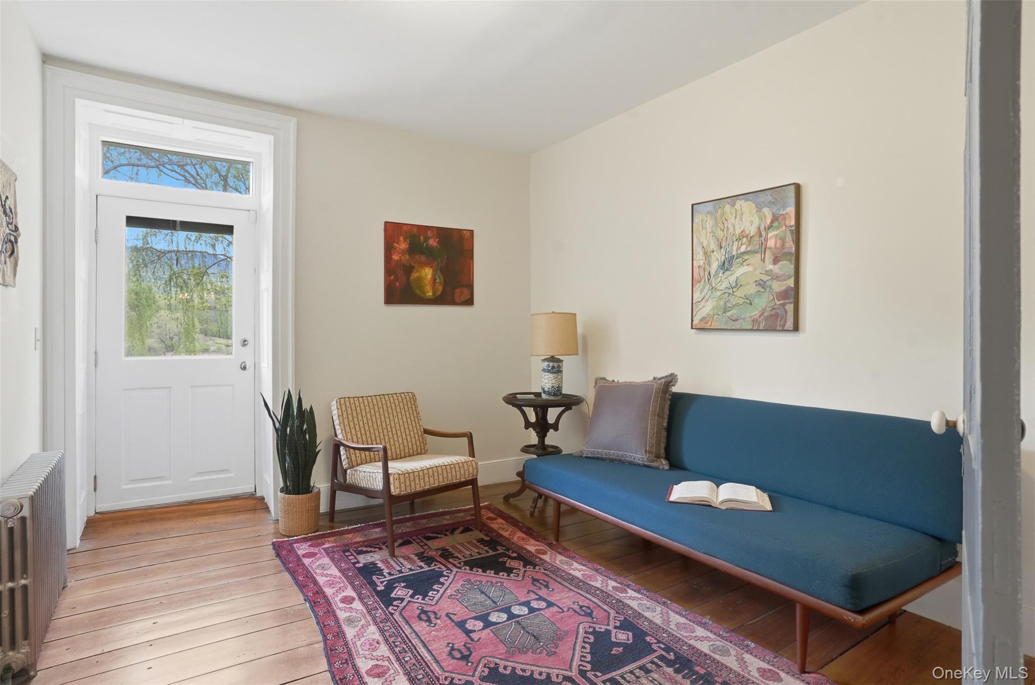 510 Decker Road Wallkill, NY 12589 - Photo 15 of 48 The downstairs bedroom, currently utilized as a serene therapy room, features its own private entrance leading to the rear patio.