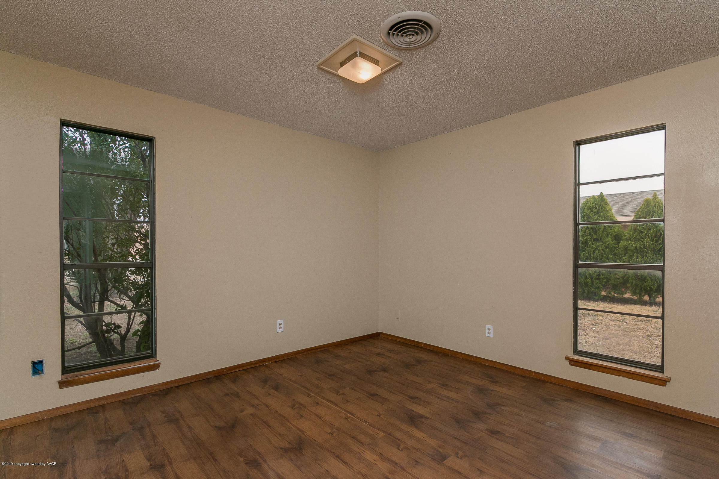 8100 Goodnight Trail Amarillo, TX 79110 - Photo 14 of 20 an empty room with window