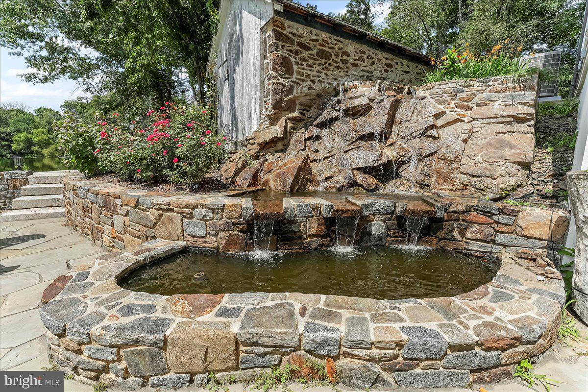 80 Heyburn Road Chadds Ford, PA 19317 - Photo 13 of 75 a view of swimming pool with a patio