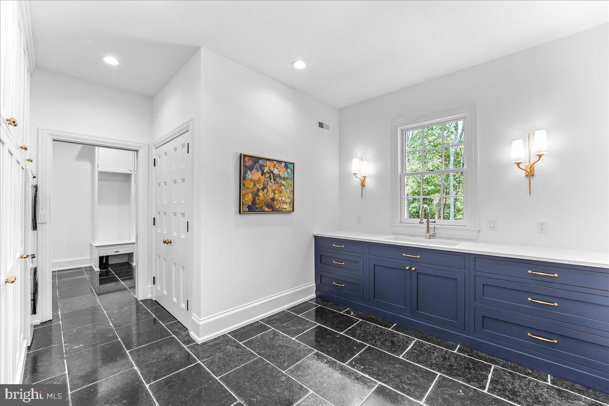 80 Heyburn Road Chadds Ford, PA 19317 - Photo 41 of 75 a view of kitchen with granite countertop cabinets and window