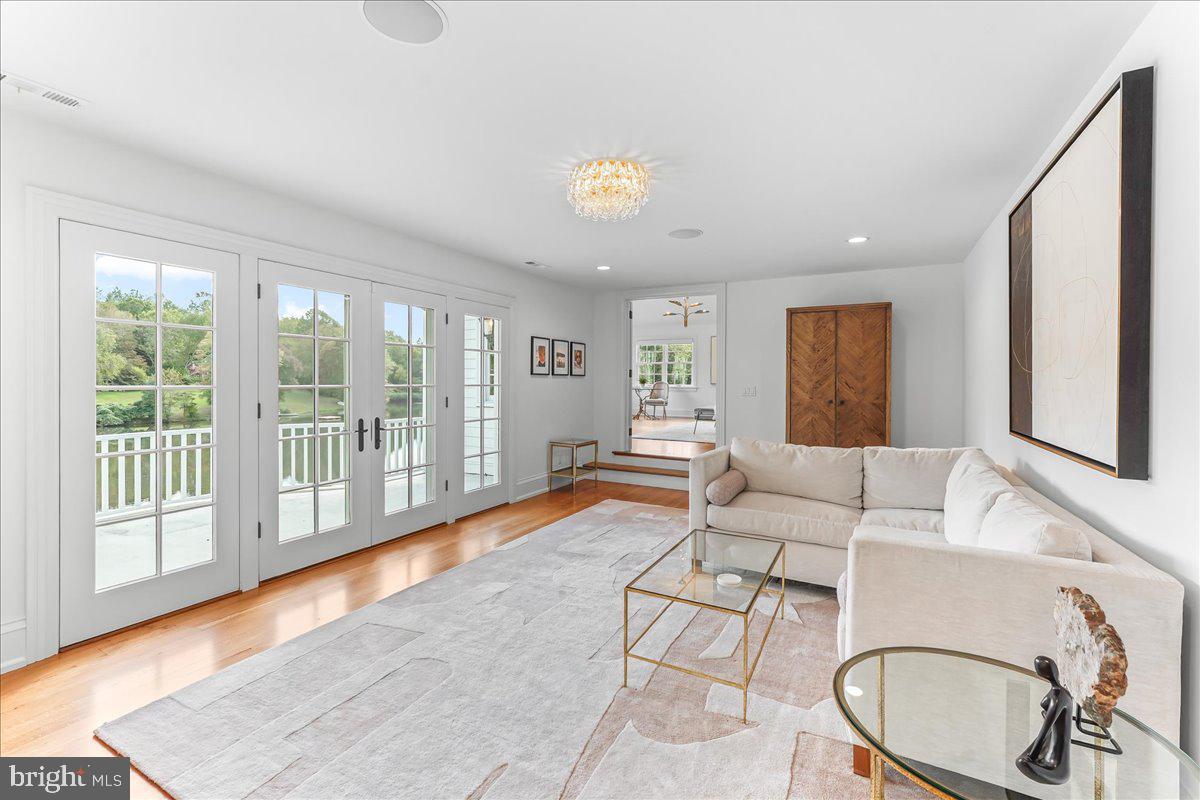 80 Heyburn Road Chadds Ford, PA 19317 - Photo 46 of 75 a living room with furniture and a large window