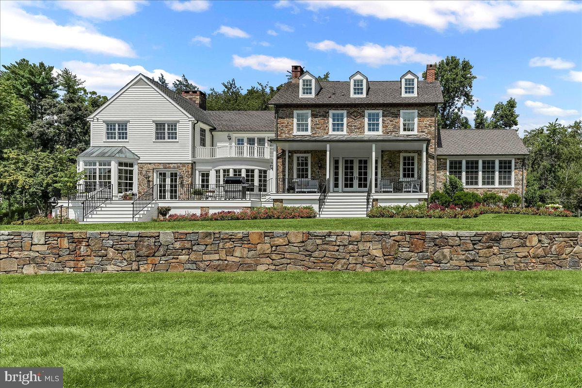 80 Heyburn Road Chadds Ford, PA 19317 - Photo 5 of 75 a front view of a house with a garden