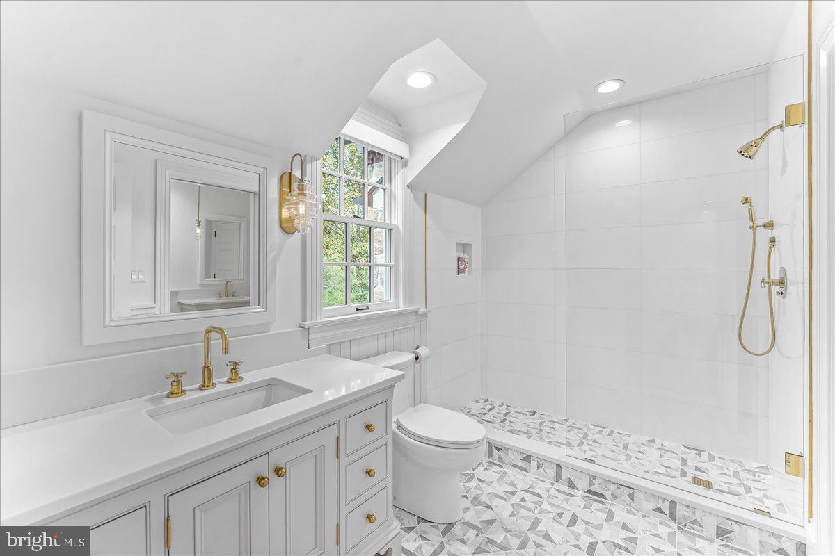 80 Heyburn Road Chadds Ford, PA 19317 - Photo 53 of 75 a bathroom with a sink a toilet and shower