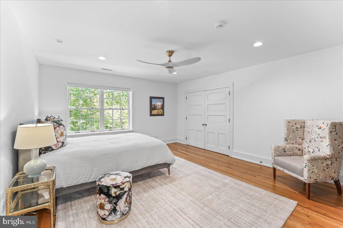 80 Heyburn Road Chadds Ford, PA 19317 - Photo 54 of 75 a bedroom with furniture and a window