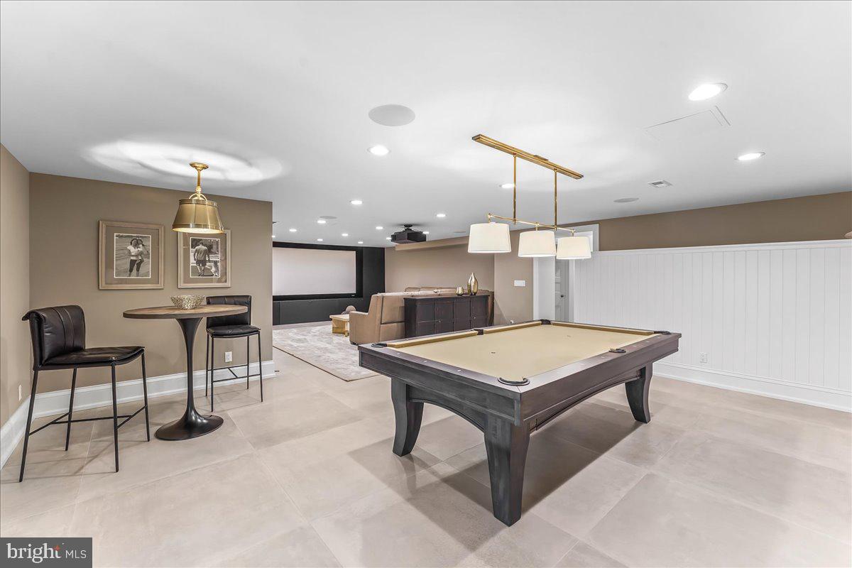 80 Heyburn Road Chadds Ford, PA 19317 - Photo 62 of 75 a room with stainless steel appliances kitchen island a table and chairs in it