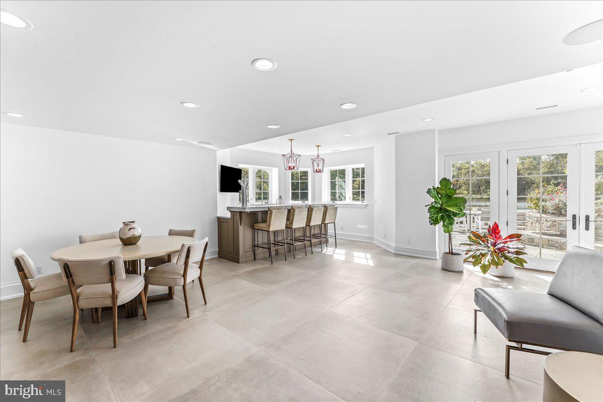 80 Heyburn Road Chadds Ford, PA 19317 - Photo 64 of 75 a dining room with furniture and wooden floor