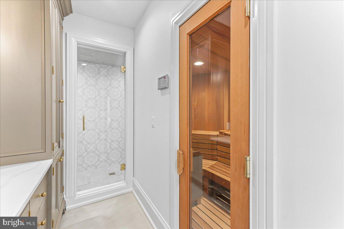 80 Heyburn Road Chadds Ford, PA 19317 - Photo 68 of 75 a bathroom with a bathtub and a shower