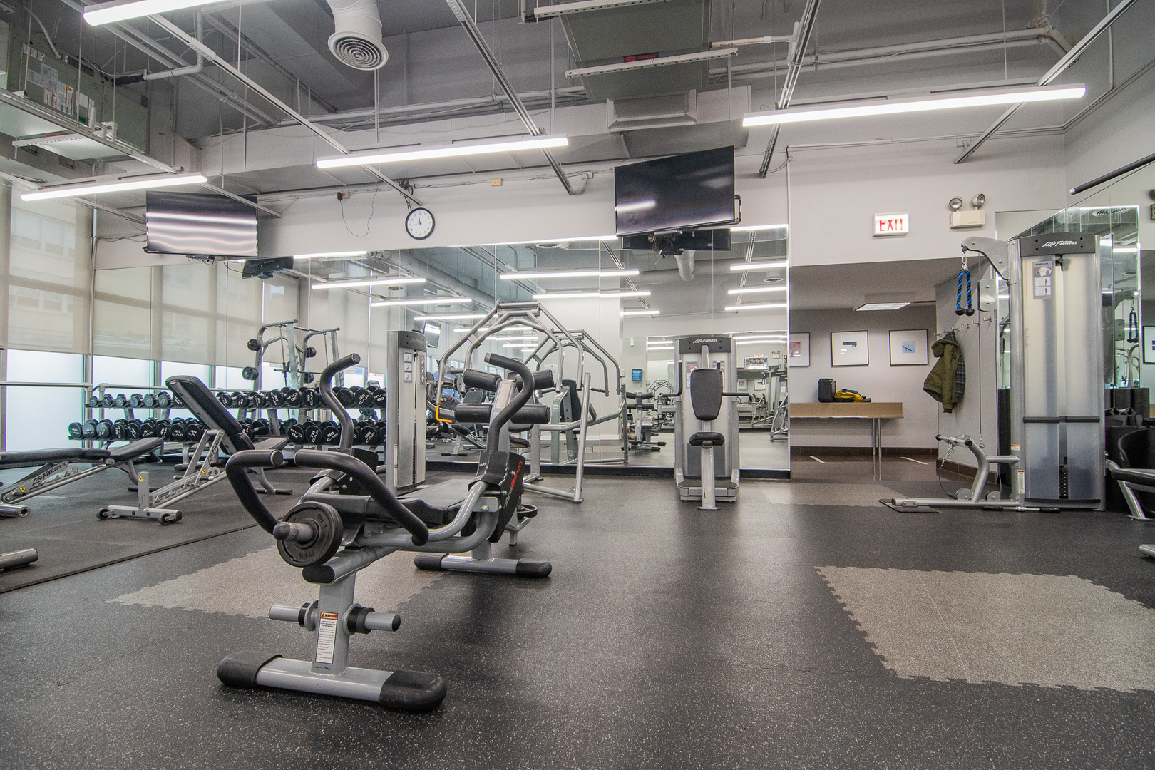 655 West Irving Park Road, Unit 3704 Chicago, IL 60613 - Photo 29 of 36 a view of a room with gym equipment